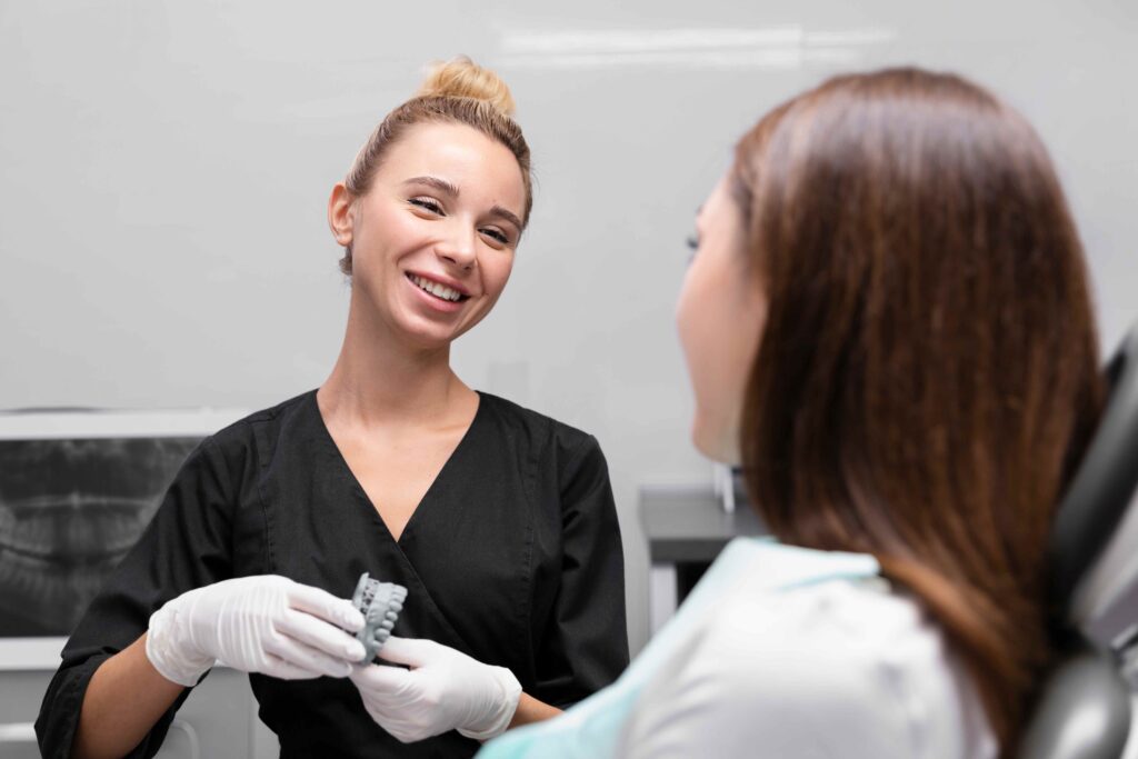 A cheerful woman with a toothbrush emphasizes the significance of maintaining oral health and hygiene.